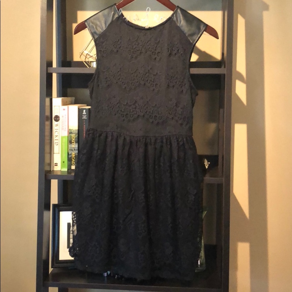 Black lace dress with leather accent